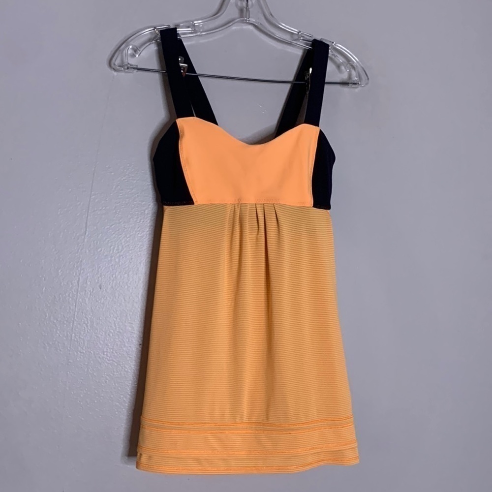 Lululemon Athletica back on track pumpkin orange racer baby doll tank top 6